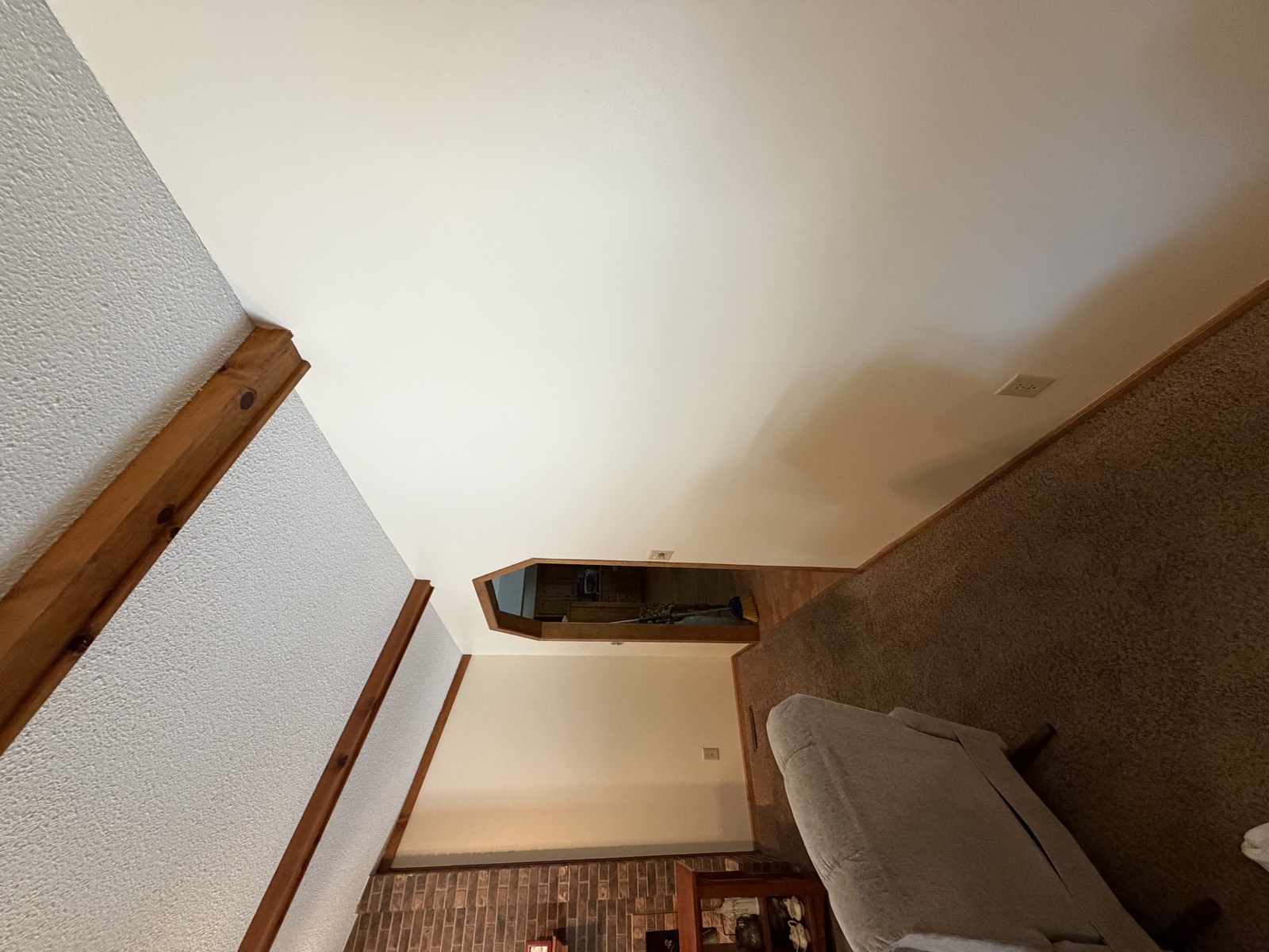 After: smooth, freshly painted beige living room wall