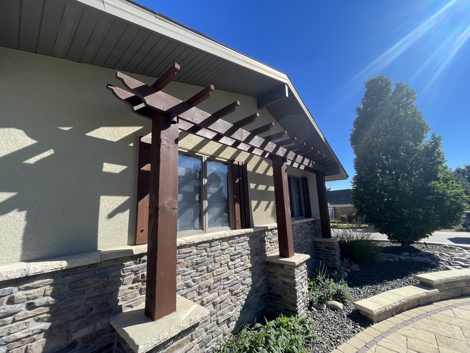 After: pergola with rich fresh wood stain