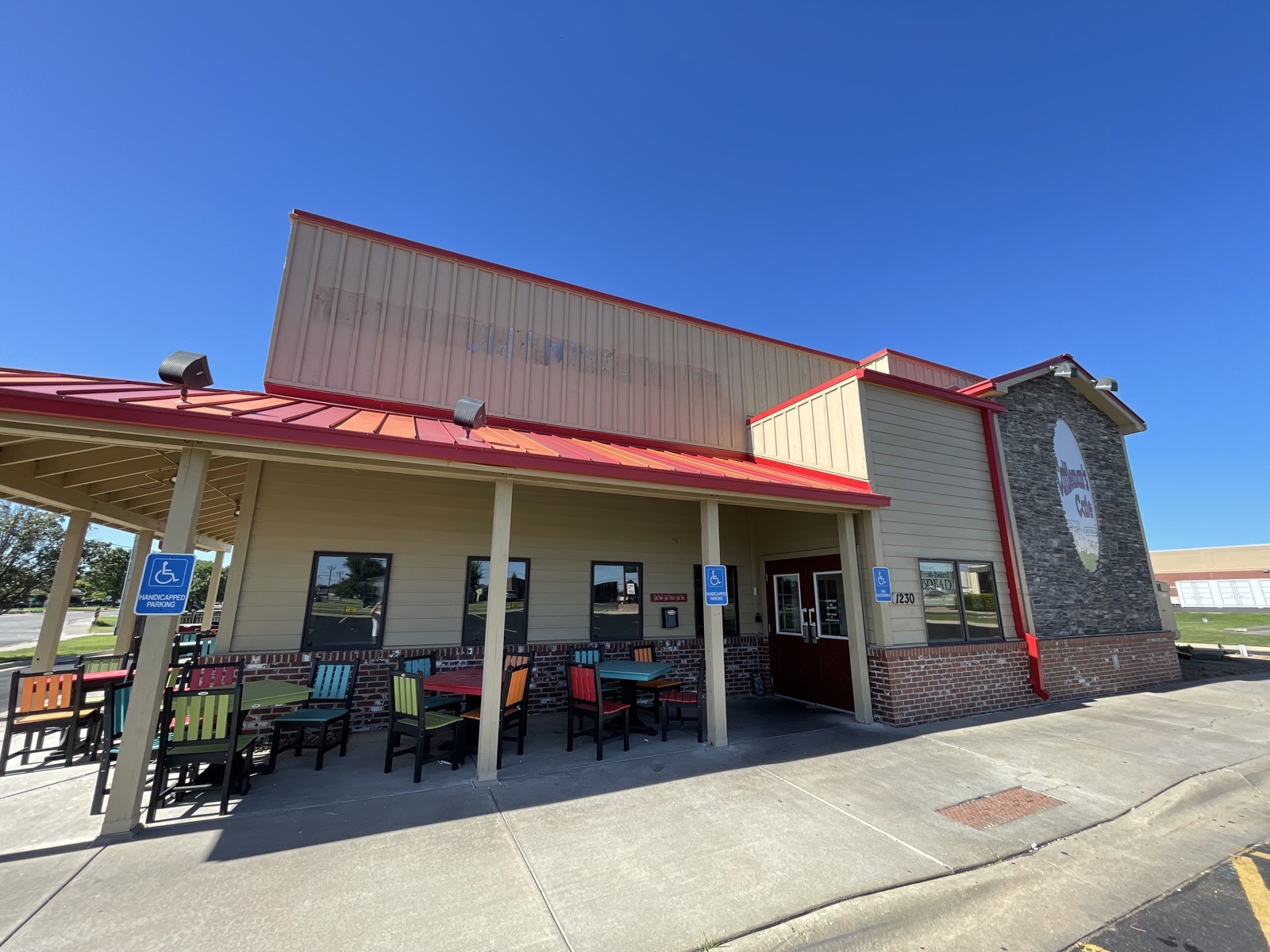 Before: restaurant exterior in faded tan